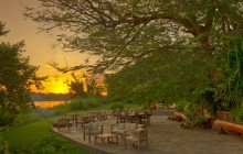 Sunset over the dining deck at Kanyemba
